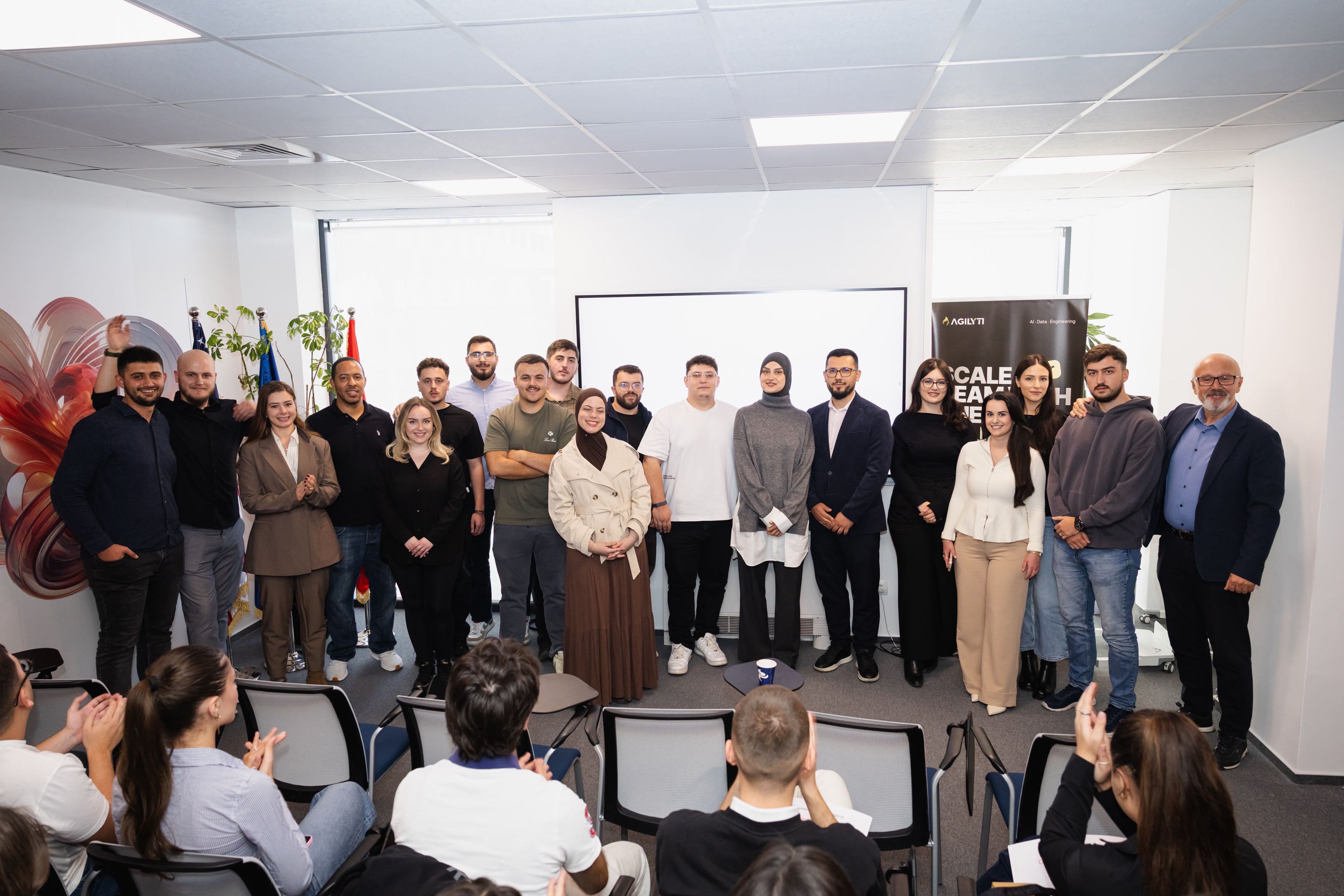 Hackathon participants and mentors on stage